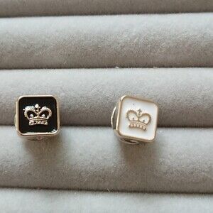 Black and white Crown brooch/pins